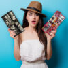 beautiful surprised young woman with sandals standing in front o